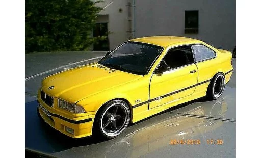 Bmw M3 coupe 1/18 Ut Models jaune E36 jantes ac schnitzer 18 pouces modellini auto