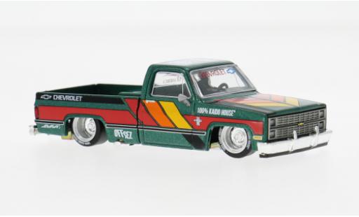 Chevrolet Silverado 1/64 Mini GT Kaido Works V3 gr&uuml;n/Dekor 1980 1:64 modellino in miniatura