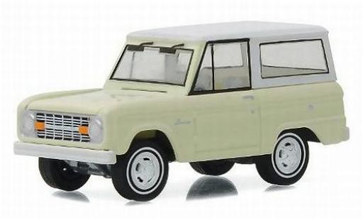 Ford Bronco 1/64 Greenlight beige/bianco 1966 50th Anniversaire Edition sans Vitrine modellino in miniatura