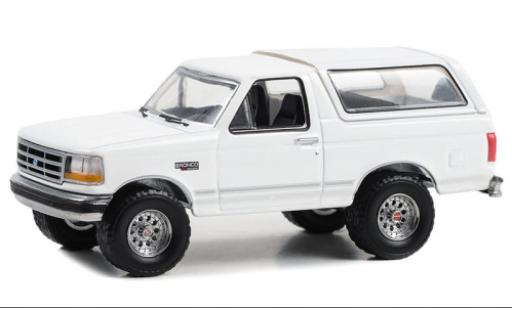 Ford Bronco 1/64 Greenlight XLT bianco 1993 modellino in miniatura