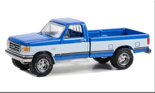 Ford F-1 1/64 Greenlight 50 XLT Lariat metallise blu/bianco 1988 modellino in miniatura