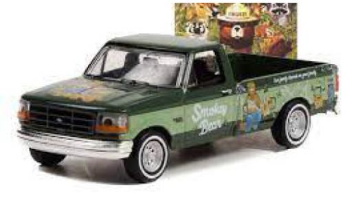 Ford F-250 1/64 Greenlight vert foncé/la chaux Smokey Bear 1995 modellino in miniatura