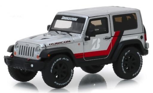 Jeep Wrangler 1/43 Greenlight Rubicon grigio/Dekor Bridgestone 2014 modellino in miniatura