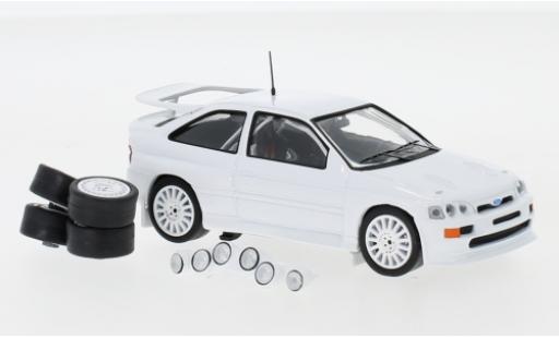 Ford Escort 1/43 IXO RS Cosworth bianco 1994 Plain Body Version y compris les 4 Ersatzräder et extra Scheinwerfer modellino in miniatura