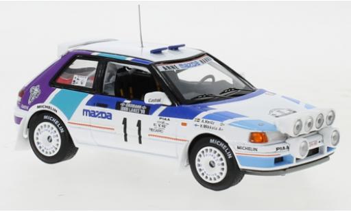 Mazda 323 1/43 IXO GTX No.11 Rally Team Europe 1000 Lakes Rallye 1990 with night lights H.Mikkola/A.Hertz modellino in miniatura