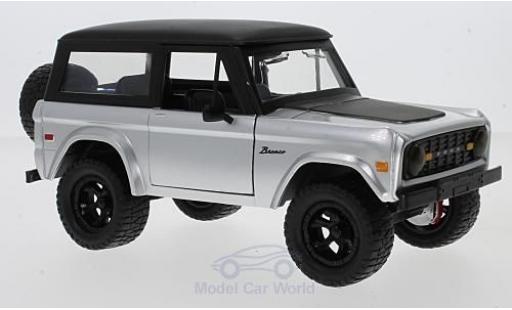 Ford Bronco 1/24 Jada Toys grigio/nero 1973 mit Tuningrädern modellino in miniatura