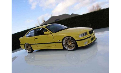 Bmw M3 coupe 1/18 Ut Models jaune E36 jantes bbs bords larges modellini auto