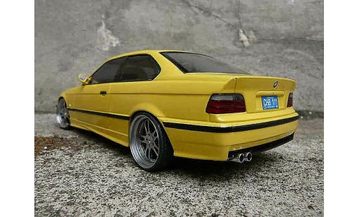 Bmw M3 coupe 1/18 Ut Models jaune E36 jantes alu tuning modellini auto