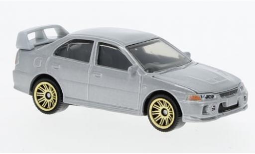 Mitsubishi Lancer 1/64 Matchbox Evolution IV metallise grau 1994 1:64 modellino in miniatura