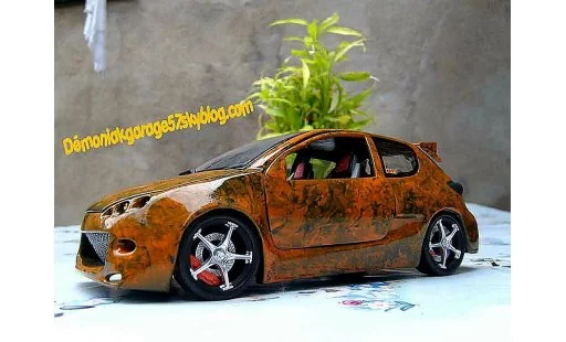 Peugeot 206 WRC 1/18 Norev street racer modellini auto