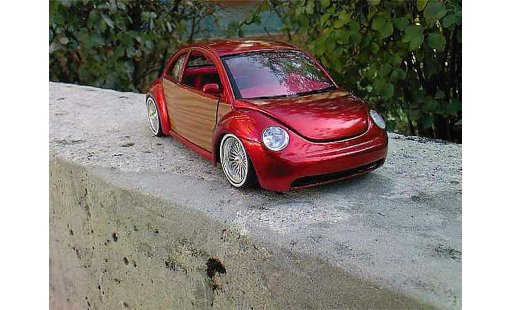 Volkswagen New Beetle Base 1/18 Burago low rider modellini auto