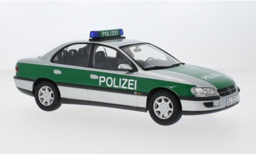 Opel Omega 1/18 Triple 9 Collection B Polizei (D) 1996 1:18 modellino in miniatura