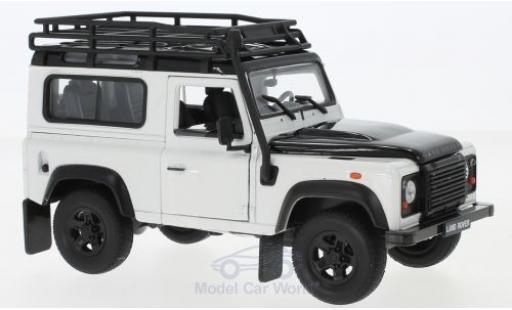 Land Rover Defender 1/24 Welly bianco/nero mit Dachgepäckträger modellino in miniatura