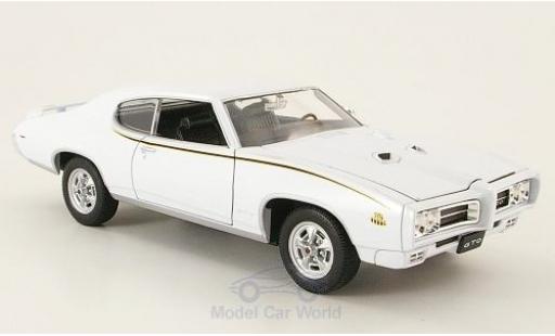 Pontiac GTO 1/24 Welly bianco 1969 The Judge ohne Vitrine modellino in miniatura