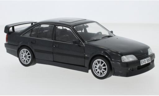 Opel Omega 1/24 WhiteBox Evolution 500 nero 1991 modellino in miniatura