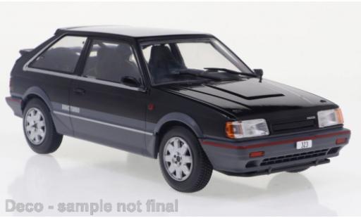 Mazda 323 1/24 WhiteBox 4WD Turbo nero/metallise grau 1989 modellino in miniatura